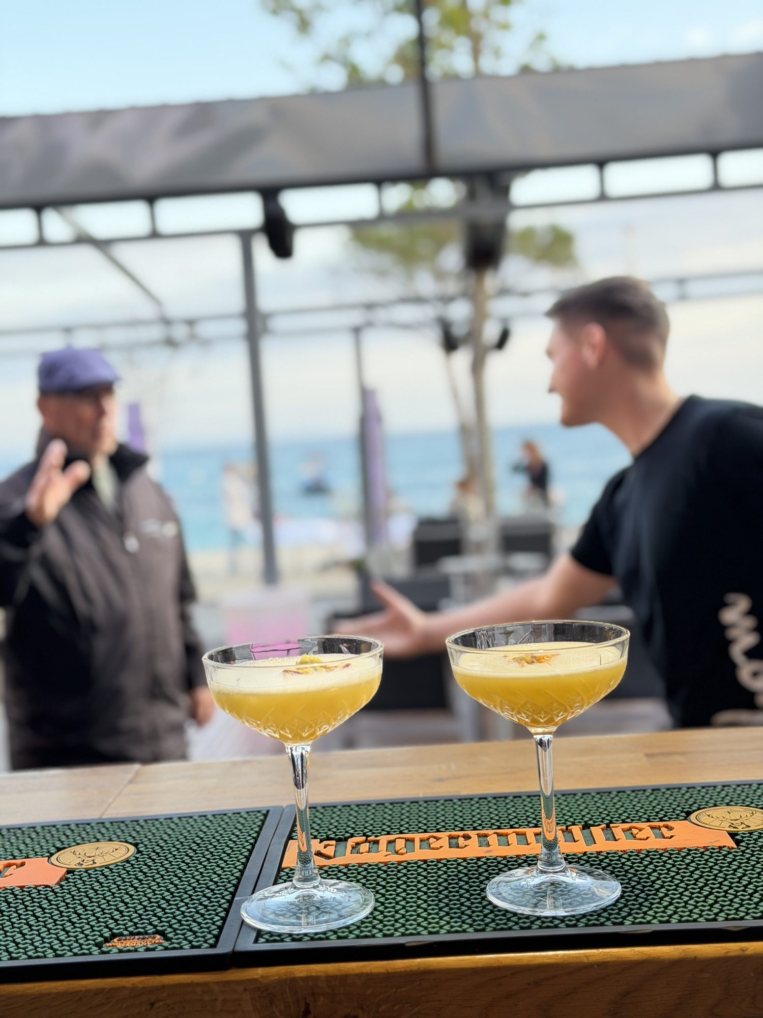 Guests enjoying cocktails at Mojo